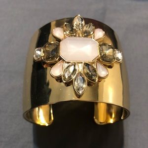 Gold bracelet with stones